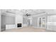 Open living room with high ceilings, fireplace and hardwood floors at 1017 Muscovy Pl., Conway, SC 29526