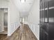 Bright entry hallway with wood floors and wainscoting at 1378 Tessera Way, Myrtle Beach, SC 29579