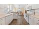 Kitchen with white cabinets, tile floors, and appliances at 2016 Neath Ct., Myrtle Beach, SC 29588