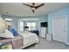 Spacious bedroom with light blue walls, king bed, and walk-out access at 2241 Waterview Dr. # 326, North Myrtle Beach, SC 29582