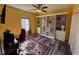 Bedroom with built-in shelving, workspace, and rug at 225 Coachman Dr., Pawleys Island, SC 29585