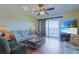 Relaxing living room with wicker furniture and water views at 300 63Rd Ave. N # 306-C, North Myrtle Beach, SC 29582