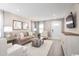 Bright and airy living room with hardwood floors and large windows at 317 Bent Green Ct. # 84B, Murrells Inlet, SC 29576
