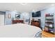 Serene Primary bedroom with hardwood floors and large TV at 333 Ashwood Ln., Myrtle Beach, SC 29588