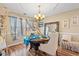 Charming dining area with hardwood floors and elegant chandelier at 333 Ashwood Ln., Myrtle Beach, SC 29588