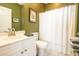 Clean bathroom with white vanity and shower/tub combo at 4161 Hibiscus Dr. # 203, Little River, SC 29566