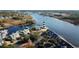 Aerial view of waterfront community with lighthouse and boats at 4530 Lighthouse Dr. # 31-C, Little River, SC 29566