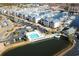 Aerial view of community pool, marina, and building at 4530 Lighthouse Dr. # 31-C, Little River, SC 29566