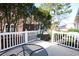 Small backyard with white fence and patio furniture at 4530 Lighthouse Dr. # 31-C, Little River, SC 29566