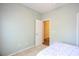 Bedroom with carpet and door to adjoining bathroom at 4530 Lighthouse Dr. # 31-C, Little River, SC 29566