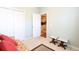 Bedroom with sofa, side tables, and access to kitchen at 4530 Lighthouse Dr. # 31-C, Little River, SC 29566