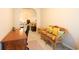 Home office with wicker settee and view into living room at 4530 Lighthouse Dr. # 31-C, Little River, SC 29566