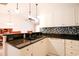 Modern kitchen with granite countertops and white cabinets at 4530 Lighthouse Dr. # 31-C, Little River, SC 29566