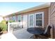 Private patio with table and chairs, adjacent to the building at 4530 Lighthouse Dr. # 31-C, Little River, SC 29566
