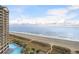 Aerial view showcasing beach, pool, and resort building at 4800 S Ocean Blvd. # 920, North Myrtle Beach, SC 29582