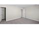 Empty bedroom with gray carpet and neutral walls at 5035 Cambria Ct., Little River, SC 29566