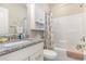 Bathroom with granite countertop, a bathtub, and a shower at 5037 Sassari St., Myrtle Beach, SC 29579