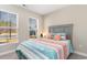 Cozy bedroom with a comfortable bed and plenty of natural light at 5037 Sassari St., Myrtle Beach, SC 29579