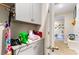 Laundry room with cabinets, granite countertop, and access to another room at 5037 Sassari St., Myrtle Beach, SC 29579