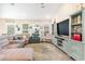 Open living room with vaulted ceilings, neutral color palette and comfortable seating at 5037 Sassari St., Myrtle Beach, SC 29579