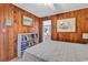 Charming bedroom with wood walls and a bookcase at 5532 Springs Ave., Myrtle Beach, SC 29577