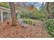 Relaxing patio with lounge chair and covered by leaves at 5532 Springs Ave., Myrtle Beach, SC 29577