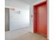 Building hallway with red elevator and exit sign at 6200 Ocean Blvd. N # 502, North Myrtle Beach, SC 29582