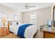 Bedroom with queen bed, side table, and dresser at 943 Ocean Blvd., Holden Beach, NC 28462