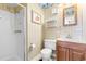 Bathroom with shower, toilet and wooden vanity at 9501 Shore Dr. # D-235, Myrtle Beach, SC 29572