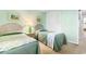 Bedroom with two twin beds and built-in closet at 9501 Shore Dr. # D-235, Myrtle Beach, SC 29572