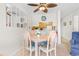 Bright dining area with table and chairs, view into kitchen at 9501 Shore Dr. # D-235, Myrtle Beach, SC 29572