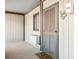 Private condo entrance with exterior door and small window at 9501 Shore Dr. # D-235, Myrtle Beach, SC 29572