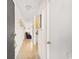 View down condo hallway, with tiled floors and access to rooms at 9501 Shore Dr. # D-235, Myrtle Beach, SC 29572