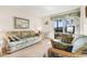 Living room with ocean view and comfortable seating at 9501 Shore Dr. # D-235, Myrtle Beach, SC 29572