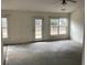 Bright living room with backyard access and ample natural light at 957 Bellflower Dr., Longs, SC 29568