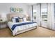 Main bedroom with a king-size bed and water views at Lot 729 Zoe Way, Myrtle Beach, SC 29588