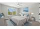 Bedroom with light-grey upholstered bed and a large window at Tbd Mud Minnow Dr., Pawleys Island, SC 29585