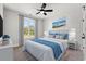 Bedroom with a queen-size bed, neutral decor, and a large window at Tbd Mud Minnow Dr., Pawleys Island, SC 29585