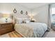 Spacious bedroom with plush bedding and nightstands at 1128 Blueback Herring Way # 156, Conway, SC 29526