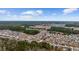 Aerial view of neighborhood with homes and landscape at 130 Tomoka Trail, Longs, SC 29568
