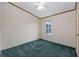 Simple bedroom with green carpet and ceiling fan at 130 Tomoka Trail, Longs, SC 29568