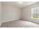 Simple bedroom with neutral walls and carpet at 1308 Crooked Hook Rd., North Myrtle Beach, SC 29582