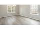 Bright dining room with hardwood floors and chandelier at 1308 Crooked Hook Rd., North Myrtle Beach, SC 29582