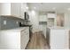 Modern kitchen with stainless steel appliances and granite countertops at 1308 Crooked Hook Rd., North Myrtle Beach, SC 29582