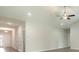 Living room with high ceiling, hardwood floors, and access to hallway at 1308 Crooked Hook Rd., North Myrtle Beach, SC 29582