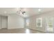 Living room with hardwood floors, high ceiling and access to backyard at 1308 Crooked Hook Rd., North Myrtle Beach, SC 29582