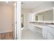 Modern bathroom with double vanity and large mirror at 132 Highwood Circle, Murrells Inlet, SC 29576