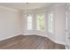 Spacious dining room with bay window and hardwood floors at 132 Highwood Circle, Murrells Inlet, SC 29576