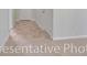 Hallway with beige tile and carpet flooring, leading to other rooms at 1522 Clubstone Dr., Conway, SC 29526