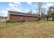 Brick home with spacious backyard and swing set at 1919 Kenneth St., Conway, SC 29526